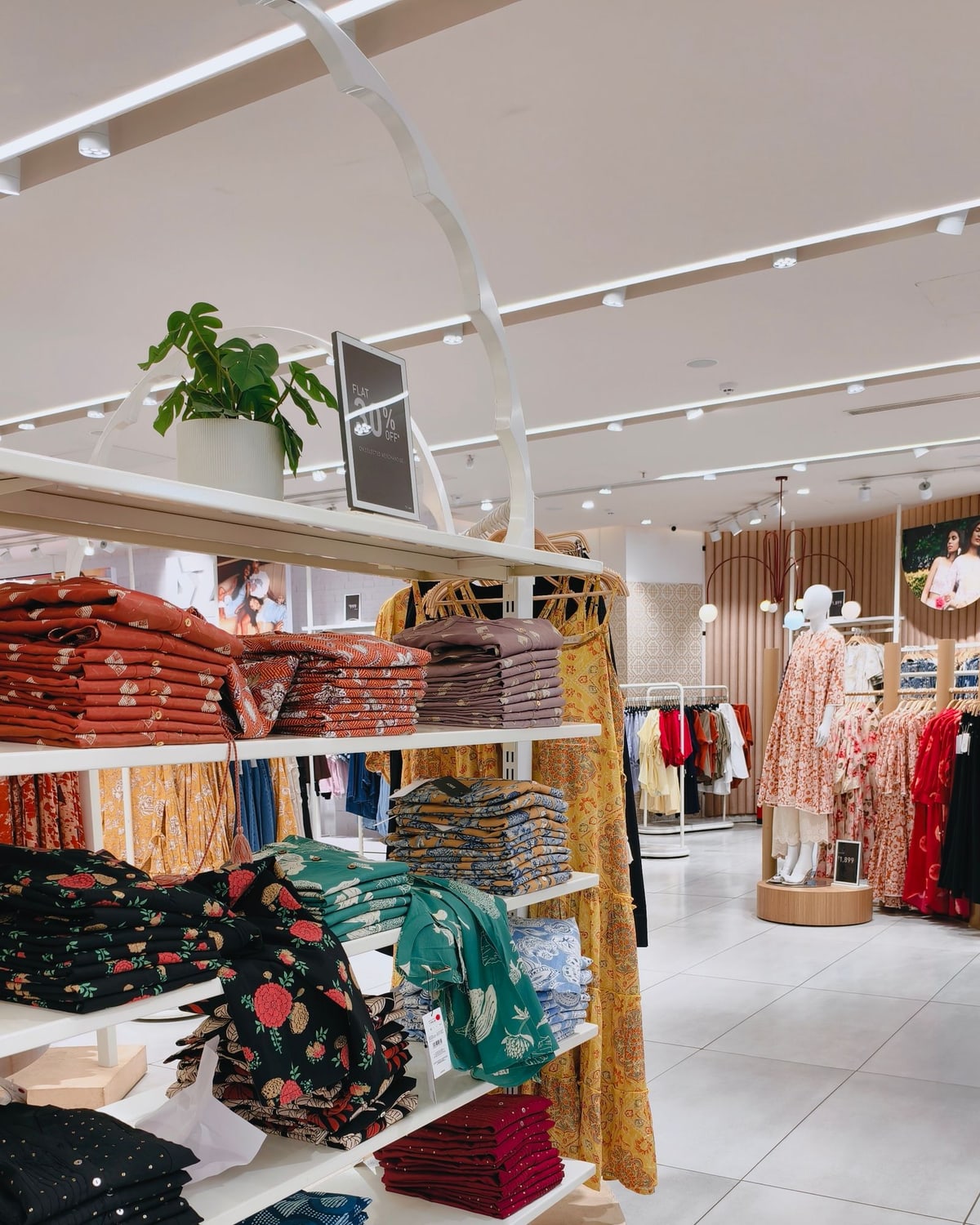 Woman browsing clothing in a boutique
